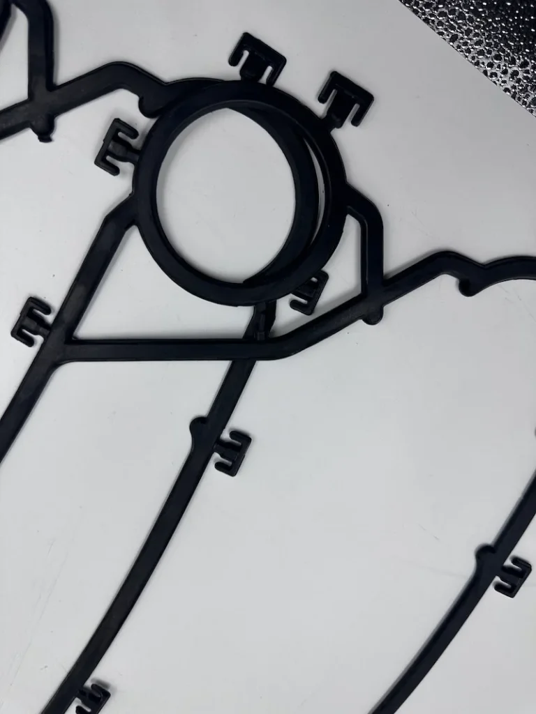Precision molded PHE gasket port details for plate heat exchanger maintenance