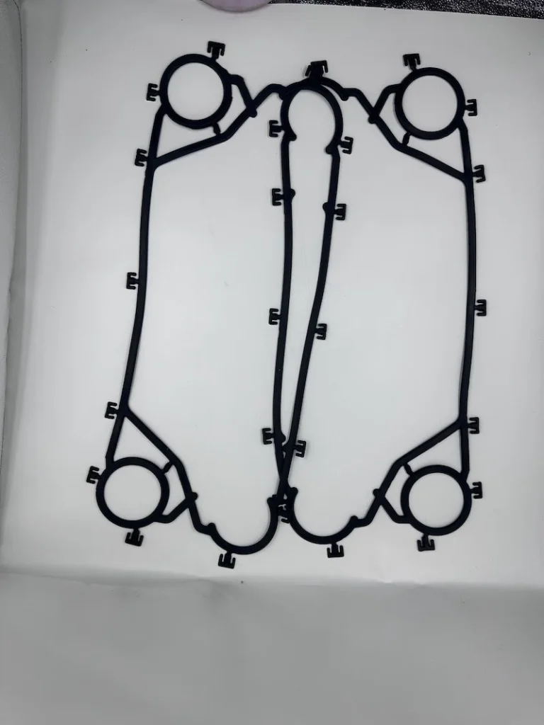 Precision-molded TL10P PHE gasket port detail for optimized fluid distribution and leak-proof performance.