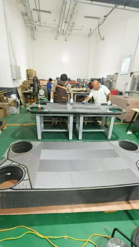 Professional manufacturing workshop for Alfa Laval series PHE gaskets and plate heat exchanger components.
