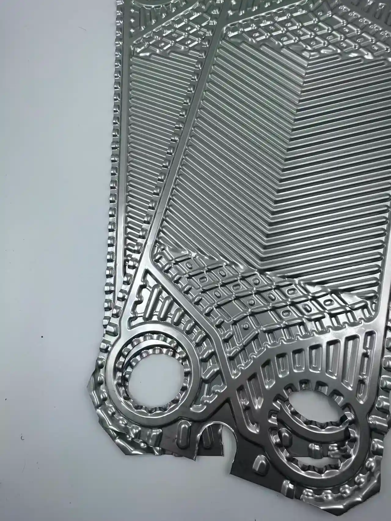 Sondex S42 stainless steel plate edge structure and pressing detail