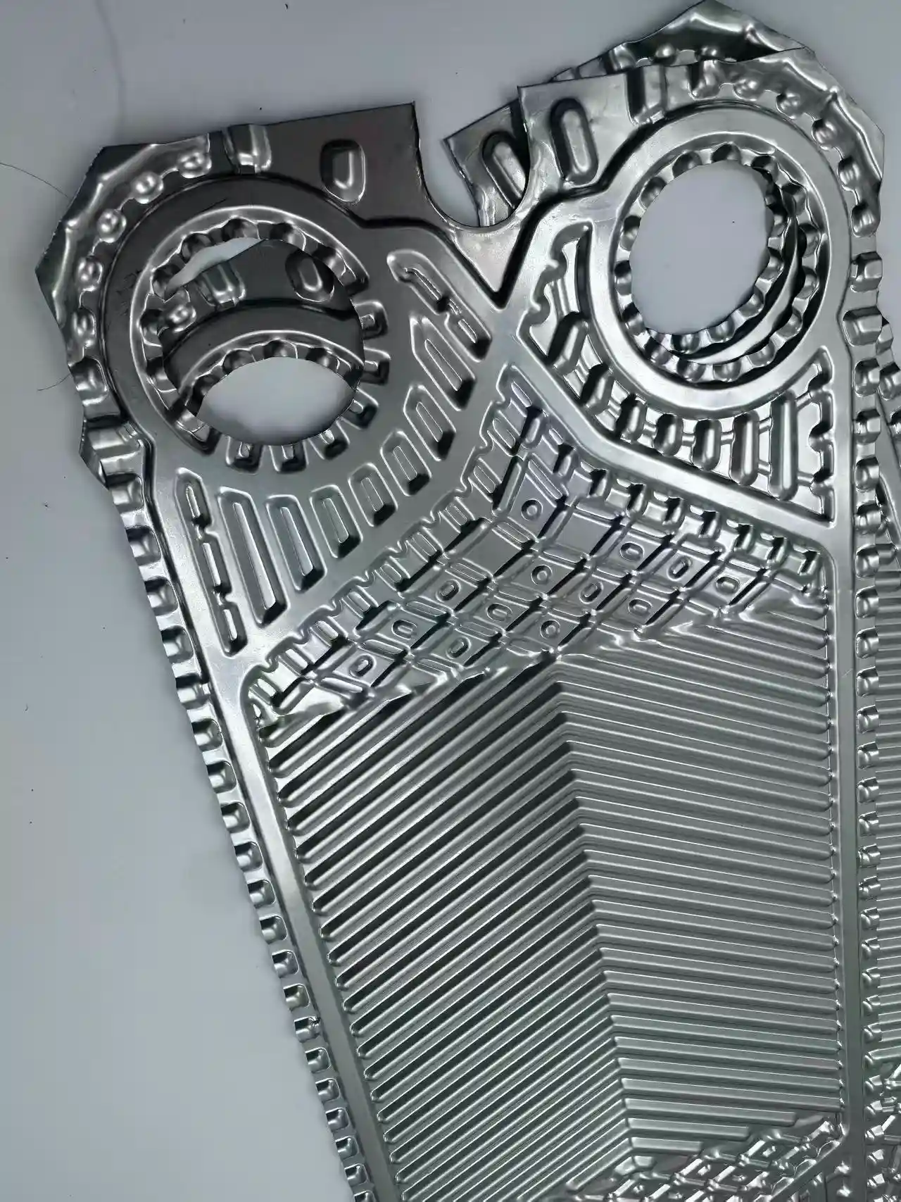 Sondex S63 stainless steel plate edge profile and forming detail