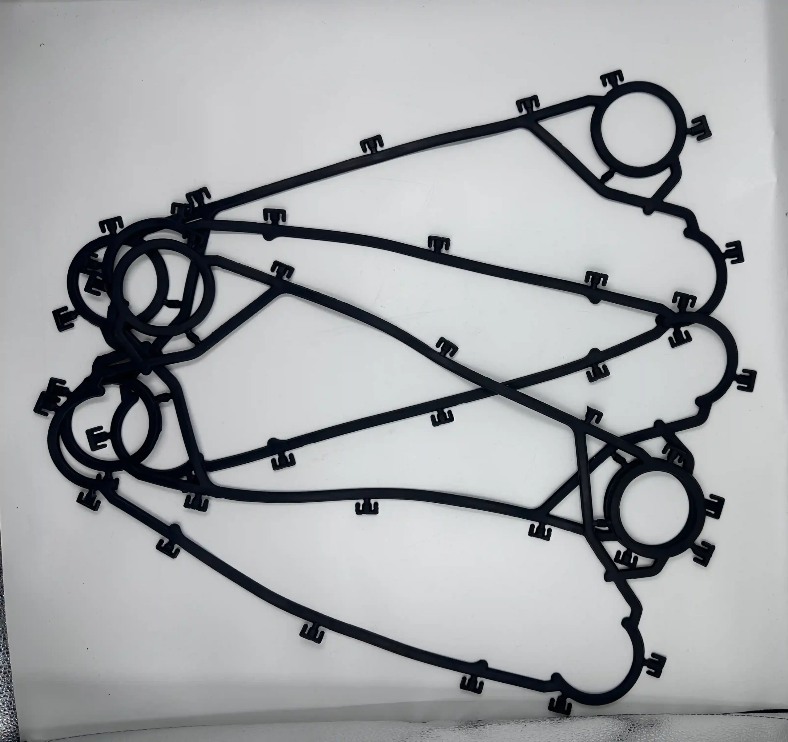 Vicarb V170 gasket sealing channel geometry for plate heat exchanger systems