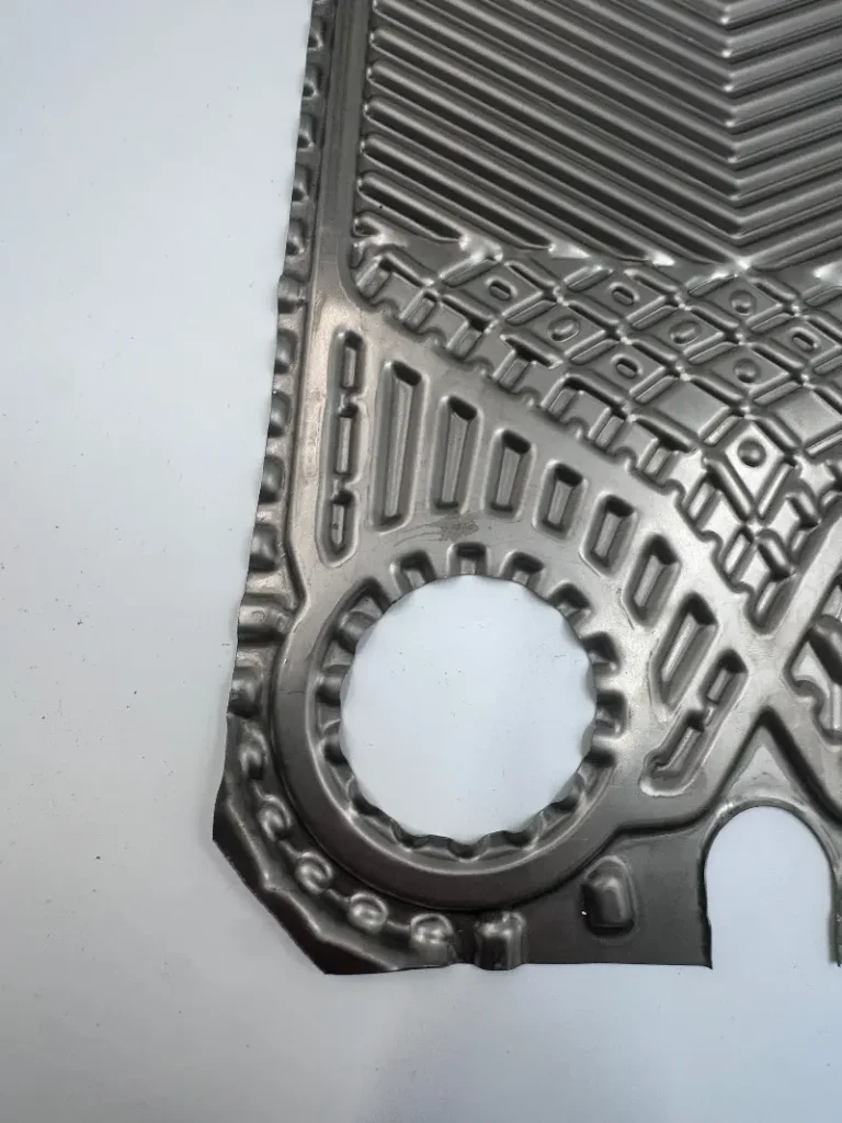 Alfa Laval TS20M replacement plate for application areas of plate heat exchangers in industrial systems.